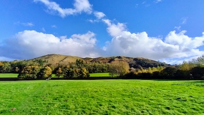 Hills behind a large field